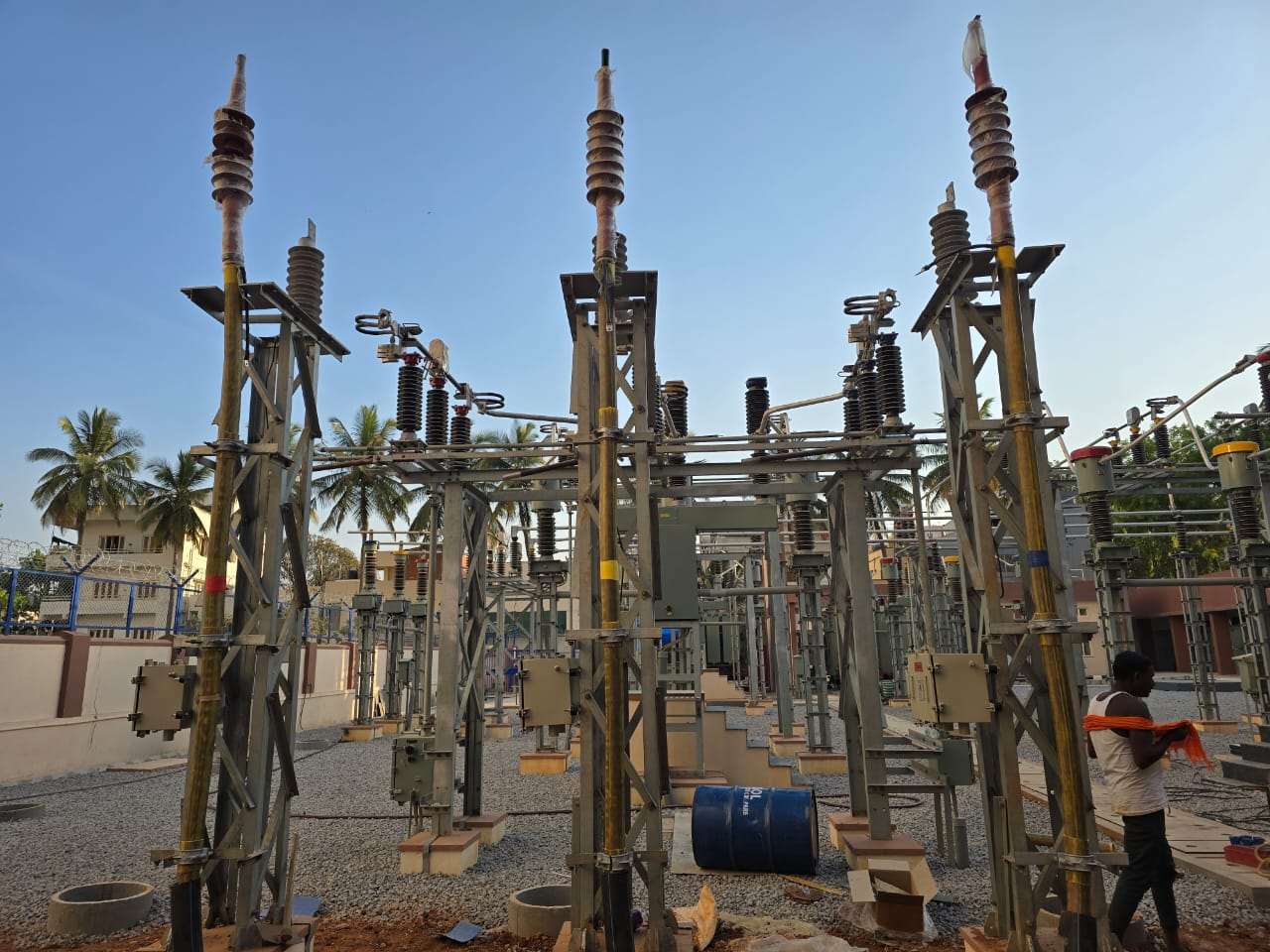 Substation gantry structures with insulators and isolators
