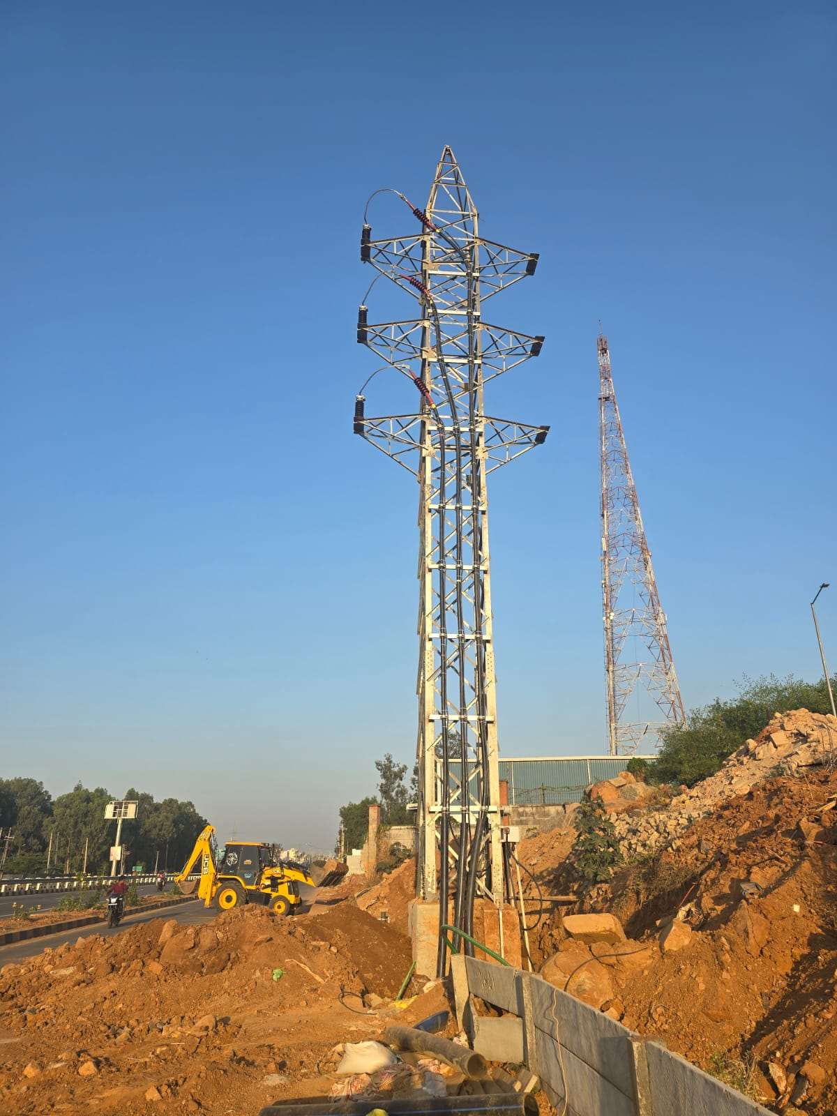 Transmission tower against a blue sky